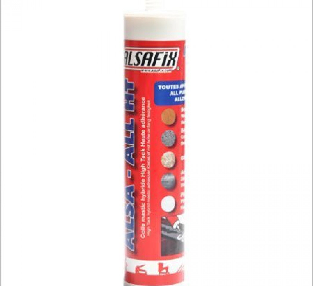 photo d'un tube rouge de colle universelle à forte adhésion